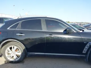 2014 Infiniti QX70 with VIN JN8CS1MU5EM450712, listed as a IAAI auction lot 41734354 with 164,349 mi miles and . Bid and sale history available at DreamBid. Image 13.