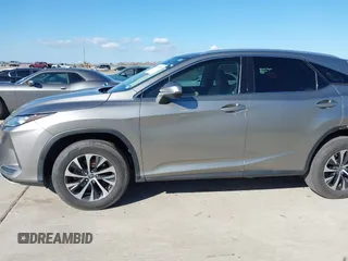 2020 Lexus RX with VIN 2T2AZMAA7LC173478, listed as a IAAI auction lot 41671494 with 91,777 mi miles. Bid and sale history available at carsss.com. Image 14.