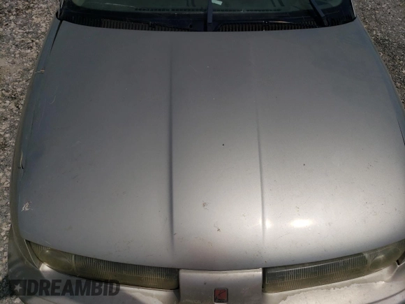 1998 Saturn SL z VIN 1G8ZK5271WZ265579, wystawiony jako Copart lot #68153934 z przebiegiem Nie podano mil oraz Szkoda całkowita • Salvage title. Historia ofert i sprzedaży dostępna na DreamBid. Obrazek 12.