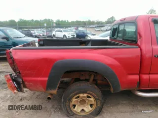 2009 Toyota Tacoma with VIN 5TEPX42N29Z669572, listed as a IAAI auction lot 41954697 with 146,908 mi miles. Bid and sale history available at carsss.com. Image 8.