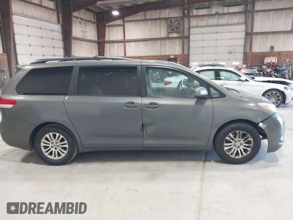 2011 Toyota Sienna XLE AAS with VIN 5TDYK3DC8BS111639, listed as a IAAI auction lot 42108488 with 300,872 mi miles and . Bid and sale history available at DreamBid. Image 13.