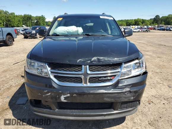 2013 Dodge Journey SE with VIN 3C4PDCAB5DT729415, listed as a Copart auction lot 55851915 with 128,782 mi miles and Salvage title. Bid and sale history available at DreamBid. Image 5.