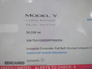 2023 Tesla Model Y Long Range with VIN 7SAYGDEE8PF599254, listed as a IAAI auction lot 41718342 with 24,339 mi miles and . Bid and sale history available at carsss.com. Image 16.