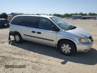 2007 Dodge Grand Caravan SE with VIN 1D4GP24R17B165507, listed as a Copart auction lot 52711705 with 200,729 mi miles and Salvage Title. Bid and sale history available at DreamBid. Image 4.