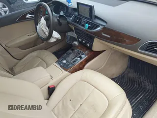 2014 Audi A6 Premium Plus z VIN WAUFGAFC4EN081900, wystawiony jako IAAI lot #42268150 z przebiegiem 150 238 mil mil oraz . Historia ofert i sprzedaży dostępna na DreamBid. Obrazek 5.