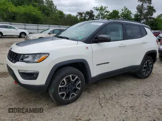 2020 Jeep Compass Trailhawk with VIN 3C4NJDDB1LT122251, listed as a Copart auction lot 55255875 with 104,462 mi miles and Salvage title. Bid and sale history available at DreamBid. Image 1.