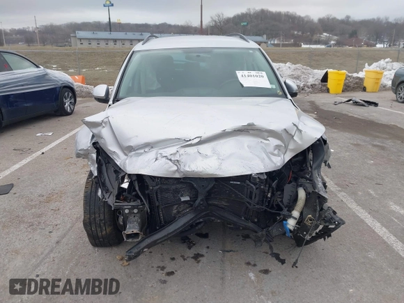 2015 Volkswagen Tiguan SE with VIN WVGAV7AX5FW592216, listed as a IAAI auction lot 41401020 with 110,726 mi miles and . Bid and sale history available at DreamBid. Image 13.