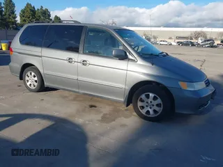 2002 Honda Odyssey EX-L z VIN 2HKRL18082H560153, wystawiony jako IAAI lot #41608351 z przebiegiem 180 537 mil mil oraz . Historia ofert i sprzedaży dostępna na DreamBid. Obrazek 1.