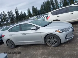 2018 Hyundai Elantra SEL with VIN 5NPD84LF8JH239866, listed as a IAAI auction lot 41597467 with 164,151 mi miles and . Bid and sale history available at DreamBid. Image 13.