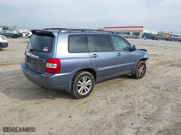 2006 Toyota Highlander Hybrid with VIN JTEEW21A360023378, listed as a IAAI auction lot 41795628 with 301,454 mi miles. Bid and sale history available at carsss.com. Image 4.