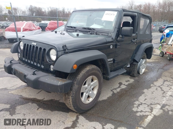 2014 Jeep Wrangler Sport with VIN 1C4AJWAG9EL312856, listed as a IAAI auction lot 42022870 with 98,323 mi miles and . Bid and sale history available at DreamBid. Image 17.