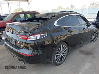2021 BMW 2 Series 228i xDrive z VIN WBA73AK05M7G55714, wystawiony jako IAAI lot #42096309 z przebiegiem 62 320 mil mil oraz . Historia ofert i sprzedaży dostępna na DreamBid. Obrazek 4.