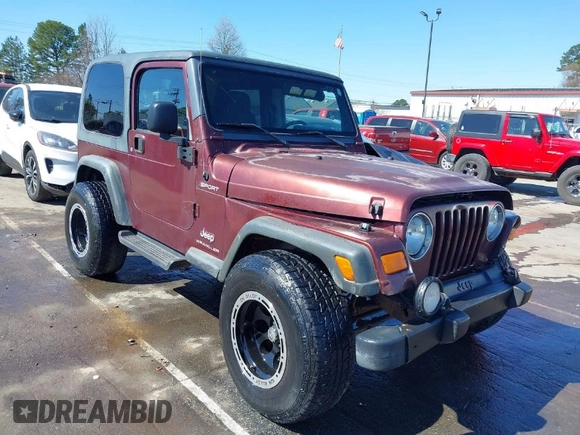 2003 Jeep Wrangler Sport with VIN 1J4FA49S33P345192, listed as a IAAI auction lot 41801344 with 196,472 mi miles. Bid and sale history available at carsss.com. Image 1.