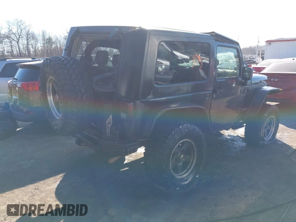 2007 Jeep Wrangler Rubicon with VIN 1J8GA64197L116283, listed as a IAAI auction lot 41008968 with 215,388 mi miles and . Bid and sale history available at DreamBid. Image 4.
