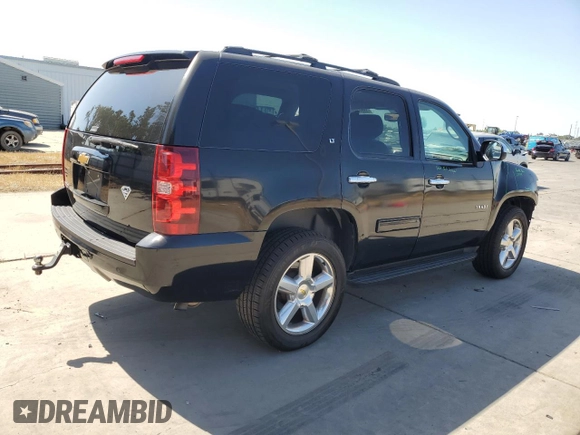 2014 Chevrolet Tahoe LT with VIN 1GNSCBE07ER115998, listed as a Copart auction lot 59577485 with 154,486 mi miles and Salvage title. Bid and sale history available at DreamBid. Image 3.