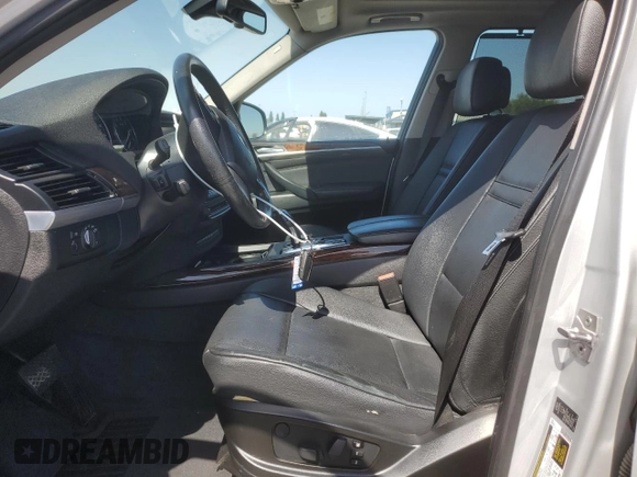 2012 BMW X5 35i with VIN 5UXZV4C5XCL751020, listed as a Copart auction lot 59327845 with 106,249 mi miles and Salvage title. Bid and sale history available at DreamBid. Image 7.