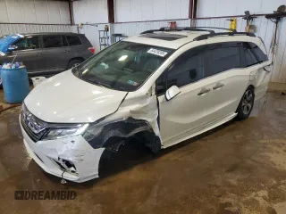 2020 Honda Odyssey Touring с VIN 5FNRL6H85LB032945, выставлен на аукционе Copart как лот 64429285 с пробегом 85 696 миль миль и Списание • Salvage title. История ставок и продаж доступна на DreamBid. Изображение 1.