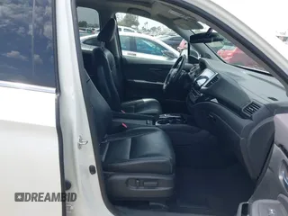 2017 Honda Pilot Touring with VIN 5FNYF5H95HB042632, listed as a IAAI auction lot 42011885 with 103,321 mi miles. Bid and sale history available at carsss.com. Image 5.
