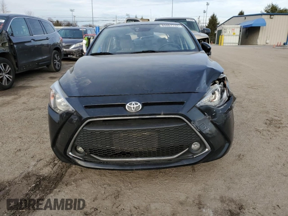 2019 Toyota Yaris L z VIN 3MYDLBYV2KY510042, wystawiony jako Copart lot #85067744 z przebiegiem Nie podano mil oraz Szkoda całkowita • Salvage title. Historia ofert i sprzedaży dostępna na DreamBid. Obrazek 5.