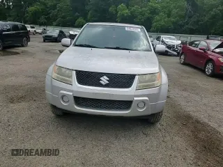 2006 Suzuki Grand Vitara z VIN JS3TE941764101657, wystawiony jako Copart lot #54943205 z przebiegiem 206 744 mil mil oraz Szkody całkowita. Historia ofert i sprzedaży dostępna na DreamBid. Obrazek 14.