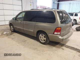2003 Ford Windstar SE with VIN 2FMZA52413BB09700, listed as a IAAI auction lot 41037056 with 179,486 mi miles and . Bid and sale history available at DreamBid. Image 3.