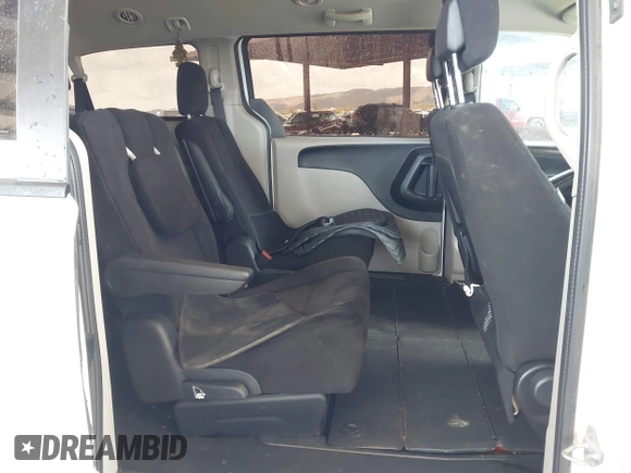2012 Dodge Grand Caravan SE with VIN 2C4RDGBGXCR407641, listed as a IAAI auction lot 41950812 with 151,331 mi miles and . Bid and sale history available at DreamBid. Image 8.