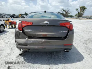 2013 Kia Optima EX z VIN 5XXGN4A72DG188821, wystawiony jako Copart lot #65546495 z przebiegiem 187 286 mil mil oraz Szkoda całkowita • Salvage title. Historia ofert i sprzedaży dostępna na DreamBid. Obrazek 6.