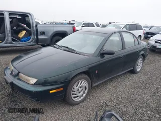 1998 Saturn SL z VIN 1G8ZK5274WZ224248, wystawiony jako IAAI lot #41741929 z przebiegiem 184 972 mil mil oraz . Historia ofert i sprzedaży dostępna na DreamBid. Obrazek 2.