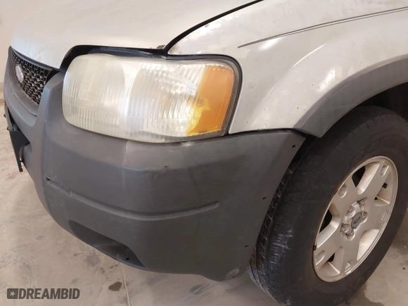 2004 Ford Escape XLT with VIN 1FMYU93164KB05521, listed as a IAAI auction lot 41723219 with 246,369 mi miles. Bid and sale history available at carsss.com. Image 6.