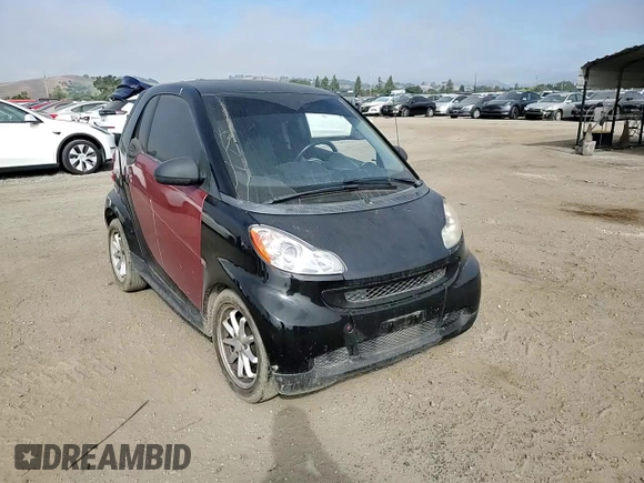 2014 Smart fortwo Pure z VIN WMEEJ3BA1EK753320, wystawiony jako Copart lot #55665555 z przebiegiem 71 305 mil mil oraz Szkody całkowita. Historia ofert i sprzedaży dostępna na DreamBid. Obrazek 13.