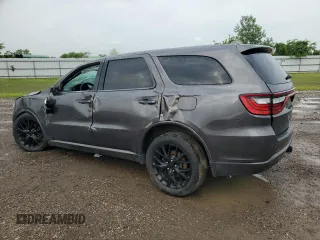 2015 Dodge Durango R/T with VIN 1C4SDHCT2FC194183, listed as a Copart auction lot 54378565 with 116,276 mi miles and Salvage title. Bid and sale history available at DreamBid. Image 2.