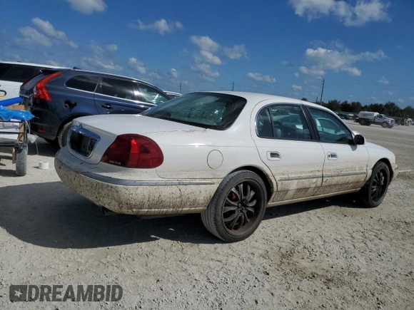 1998 Lincoln Continental with VIN 1LNFM97V5WY637895, listed as a Copart auction lot 77020154 with 0 mi miles and Salvage Title. Bid and sale history available at carsss.com. Image 3.
