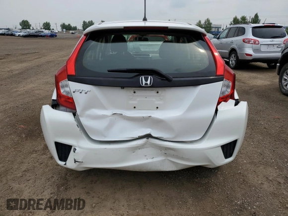 2016 Honda Fit LX with VIN JHMGK5H59GX004764, listed as a Copart auction lot 65131715 with 75,726 mi miles and Salvage title. Bid and sale history available at DreamBid. Image 6.