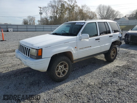 1996 Jeep Grand Cherokee Limited с VIN 1J4GZ78S2TY123592, выставлен на аукционе Copart как лот 84387624 с пробегом Не указан миль и Списание • Salvage title. История ставок и продаж доступна на DreamBid. Изображение 1.