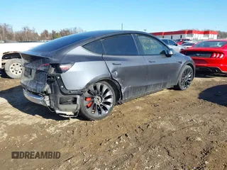 2023 Tesla Model Y Performance with VIN 7SAYGDEF1PF674417, listed as a IAAI auction lot 41421594 with 28,928 mi miles and . Bid and sale history available at DreamBid. Image 4.