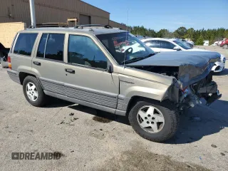 1995 Jeep Grand Cherokee Laredo with VIN 1J4GZ58S9SC706256, listed as a Copart auction lot 46635685 with 388,975 mi miles and Salvage Title. Bid and sale history available at carsss.com. Image 4.