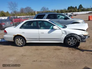 2002 Honda Accord Sdn EX with VIN 1HGCG566X2A106388, listed as a IAAI auction lot 41762046 with 227,512 mi miles. Bid and sale history available at carsss.com. Image 14.