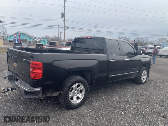 2014 Chevrolet Silverado 1500 LTZ with VIN 1GCVKSEC0EZ265504, listed as a IAAI auction lot 41737186 with 215,850 mi miles and . Bid and sale history available at DreamBid. Image 4.