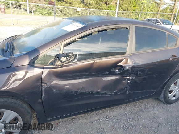 2018 Kia Forte LX with VIN 3KPFL4A70JE182702, listed as a IAAI auction lot 42043345 with 105,451 mi miles and . Bid and sale history available at DreamBid. Image 6.