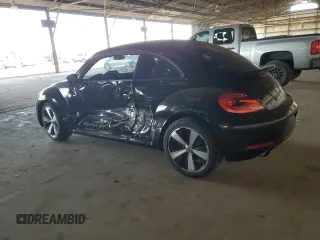 2012 Volkswagen Beetle 2.0T Turbo PZEV with VIN 3VW4A7AT3CM621473, listed as a Copart auction lot 47643595 with 32,840 mi miles and Salvage Title. Bid and sale history available at carsss.com. Image 2.