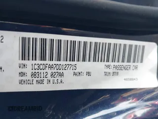 2013 Dodge Dart SE with VIN 1C3CDFAA7DD127715, listed as a IAAI auction lot 41579206 with 142,810 mi miles and . Bid and sale history available at carsss.com. Image 9.