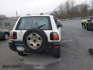 1999 Toyota RAV4 with VIN JT3HP10VXX7115145, listed as a IAAI auction lot 41853011 with 211,121 mi miles. Bid and sale history available at carsss.com. Image 17.