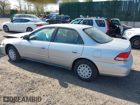 2002 Honda Accord VP z VIN 1HGCF86642A073408, wystawiony jako IAAI lot #42165850 z przebiegiem 71 998 mil mil oraz . Historia ofert i sprzedaży dostępna na DreamBid. Obrazek 3.