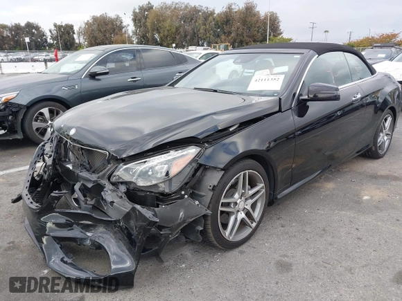 2016 Mercedes-Benz E E 400 with VIN WDDKK6FF7GF339417, listed as a IAAI auction lot 42111352 with 59,859 mi miles. Bid and sale history available at carsss.com. Image 17.