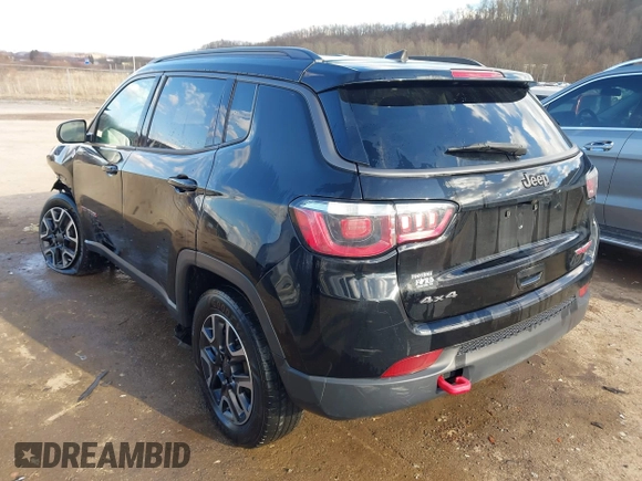 2019 Jeep Compass Trailhawk with VIN 3C4NJDDBXKT671364, listed as a IAAI auction lot 41655974 with 104,252 mi miles and . Bid and sale history available at carsss.com. Image 3.