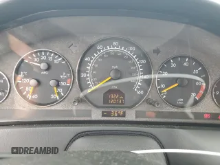 1999 Mercedes-Benz SL 500 with VIN WDBFA68F1XF177603, listed as a Copart auction lot 58983485 with 120,737 mi miles and Salvage title. Bid and sale history available at DreamBid. Image 9.