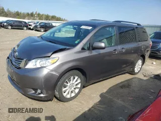 2015 Toyota Sienna Ltd with VIN 5TDDK3DC3FS127574, listed as a Copart auction lot 52703385 with 143,544 mi miles and Clean Title. Bid and sale history available at carsss.com. Image 1.
