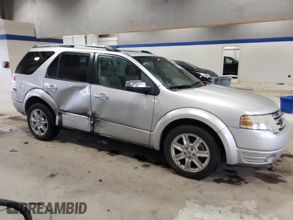 2009 Ford Taurus X Limited with VIN 1FMDK03W59GA01446, listed as a Copart auction lot 80666874 with 135,957 mi miles and Salvage title. Bid and sale history available at DreamBid. Image 4.