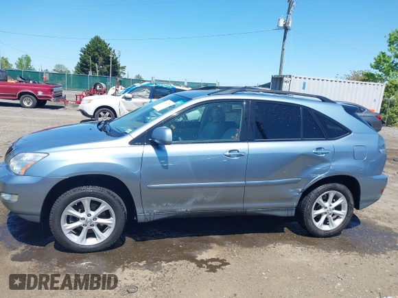 2008 Lexus RX with VIN 2T2HK31U28C057037, listed as a IAAI auction lot 42134779 with 191,968 mi miles. Bid and sale history available at carsss.com. Image 14.