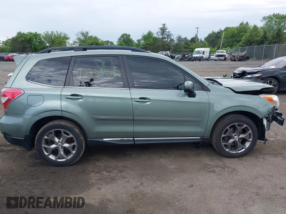 2015 Subaru Forester Touring with VIN JF2SJAWC9FH561581, listed as a IAAI auction lot 42237512 with 109,210 mi miles and . Bid and sale history available at DreamBid. Image 13.